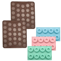 Set cofetarie Quasar & Co.®, 2 foi macarons a cate 27 forme, 3 forme x 8 gogosi, silicon, maro-bleu